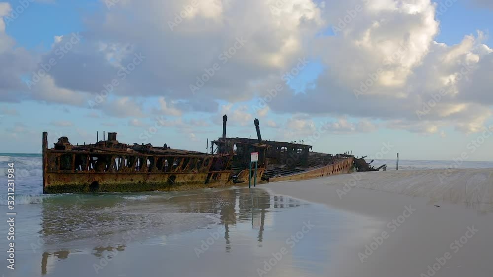 HD panning left to right motion with accompany beach sound, the abandoned SS Maheno shipwreck which washed ashore on the coastline of Fraser Island in 1935 by a cyclone and left to rust,QLD,Australia HD panning left to right motion with accompany beach sound, the abandoned SS Maheno shipwreck which washed ashore on the coastline of Fraser Island in 1935 by a cyclone and left to rust,QLD,Australia