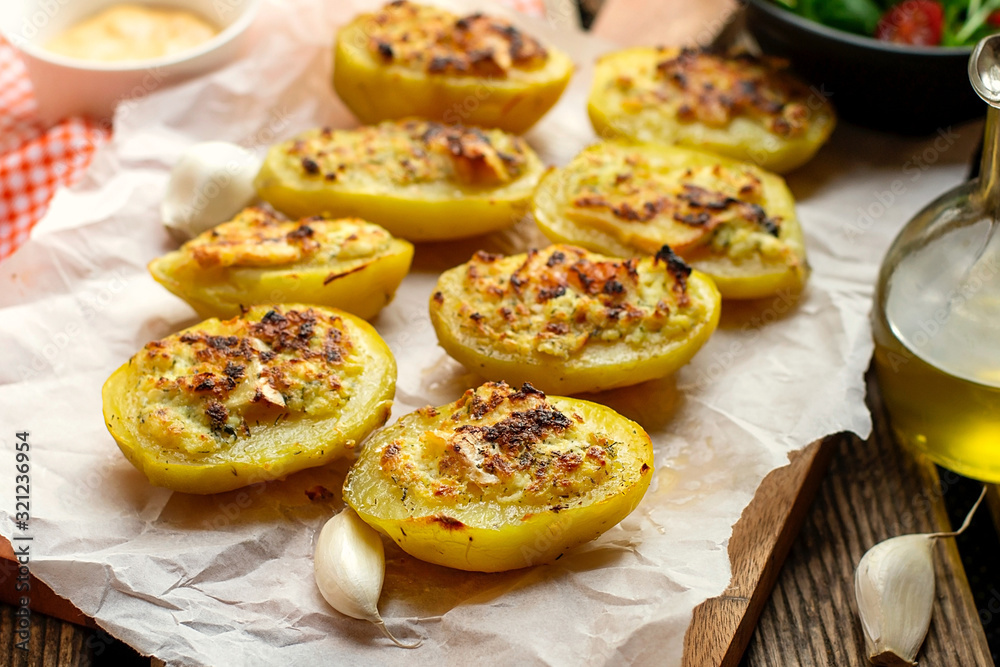 Stuffed potato halves with cheese and garlic Stuffed potato halves with cheese and garlic