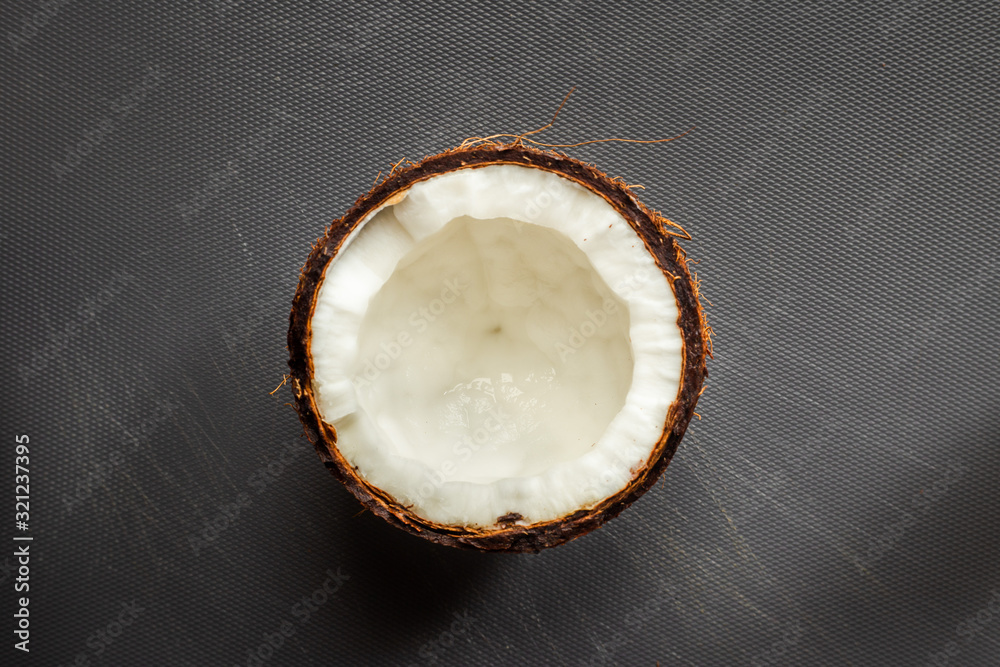close up of organic coconut in studio - obrazy, fototapety, plakaty 