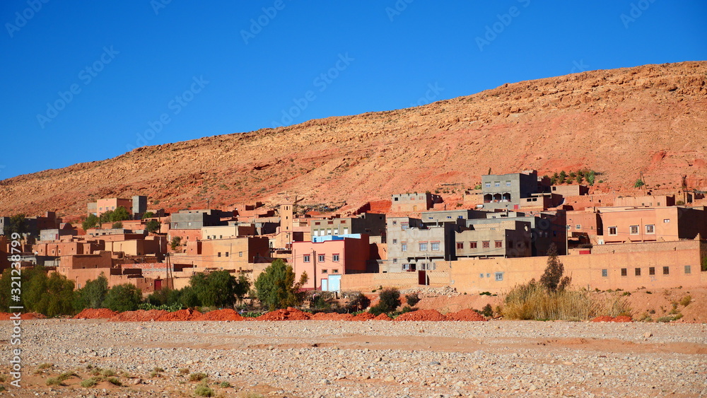 Bright landscape of Morocco, breathtaking curves of mountains, stunning combination of hills & farm land,inadvertent distribution of houses & huts, raw impression of pure nature. Bright landscape of Morocco, breathtaking curves of mountains, stunning combination of hills & farm land,inadvertent distribution of houses & huts, raw impression of pure nature.
