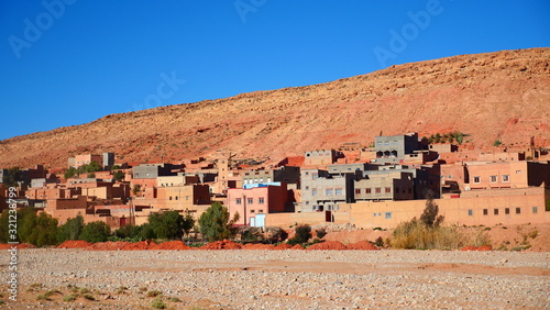 Bright landscape of Morocco, breathtaking curves of mountains, stunning combination of hills & farm land,inadvertent distribution of houses & huts, raw impression of pure nature. © Rick