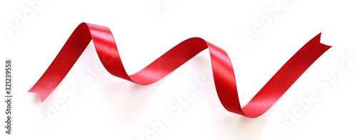 Shiny red satin ribbon isolated on white background