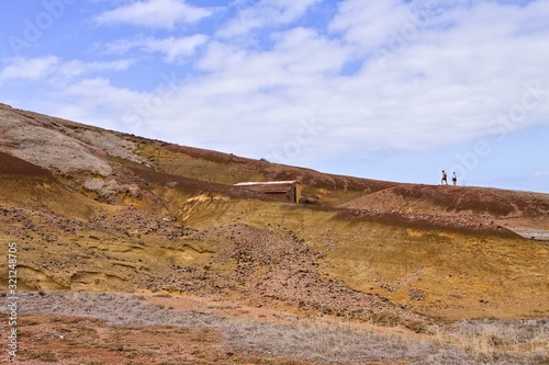 Madeira, Portugal - 20 August 2019: hiking on a slope in a desertic place 