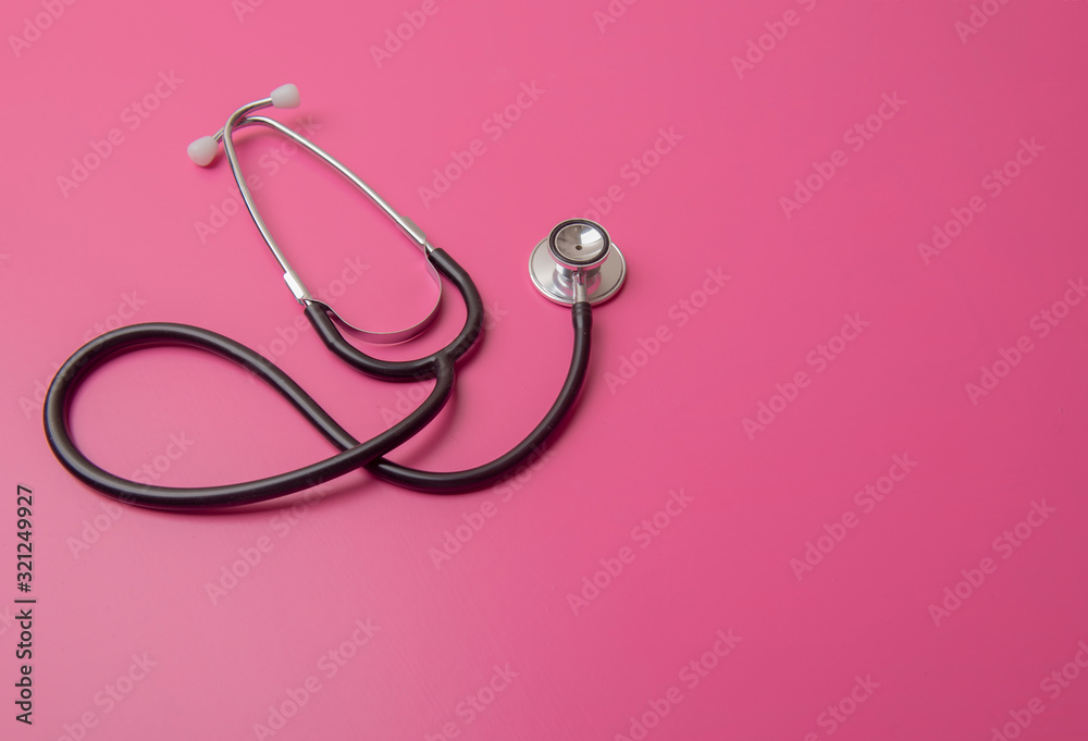 Stethoscope on pink background with copy space Stethoscope on pink background with copy space