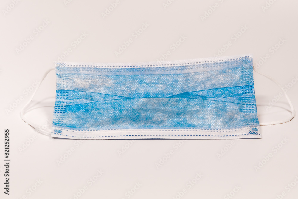 Coronavirus COVID-19 2019-nCoV biological world outbreak & flu medical concept. A medical protective face mask to illustrate Wuhan virus worldwide spread. Coronavirus COVID-19 2019-nCoV biological world outbreak & flu medical concept. A medical protective face mask to illustrate Wuhan virus worldwide spread.