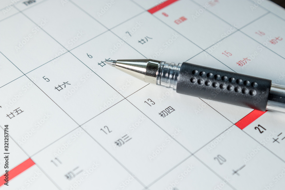 Taking notes on a calendar Taking notes on a calendar