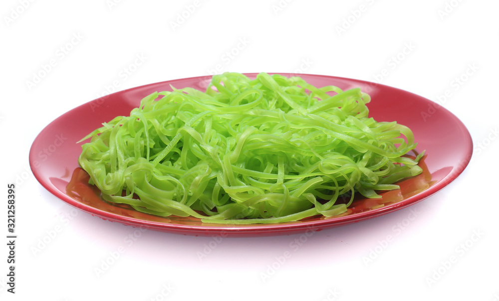green noodles on dish isolated on white background green noodles on dish isolated on white background