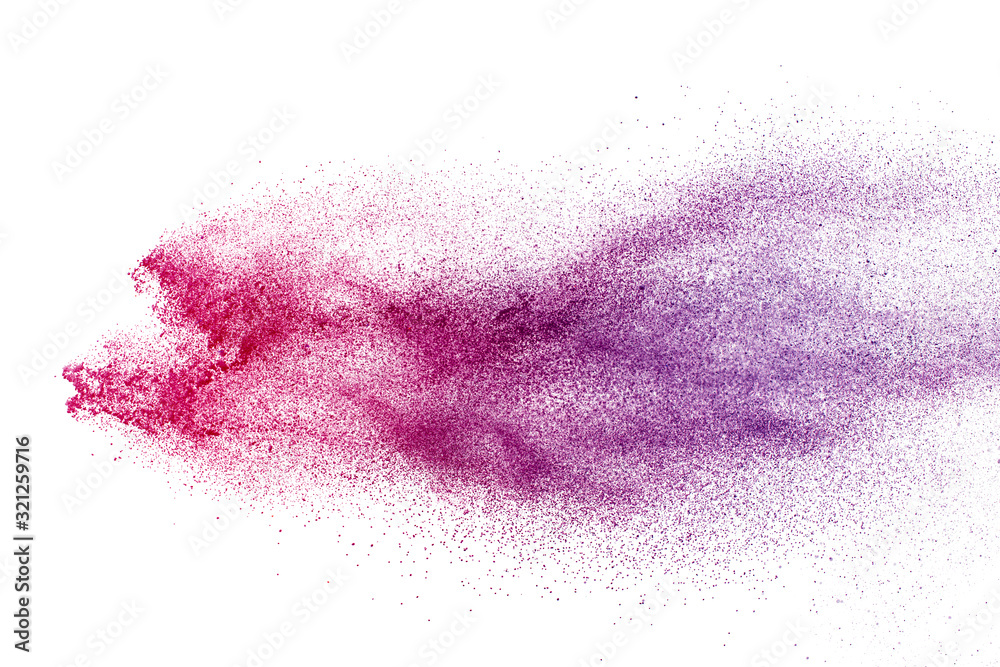 Freeze motion of purple color powder exploding on white background. Freeze motion of purple color powder exploding on white background.