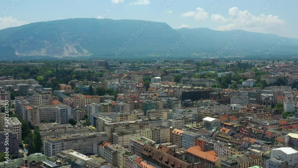 flight over sunny day geneva city rooftops mountains aerial panorama 4k switzerland flight over sunny day geneva city rooftops mountains aerial panorama 4k switzerland
