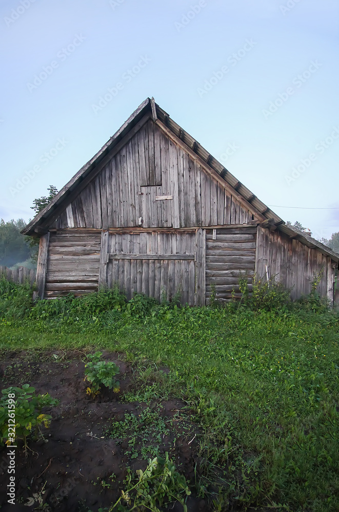 Old wooden cowshed building in countryside Old wooden cowshed building in countryside