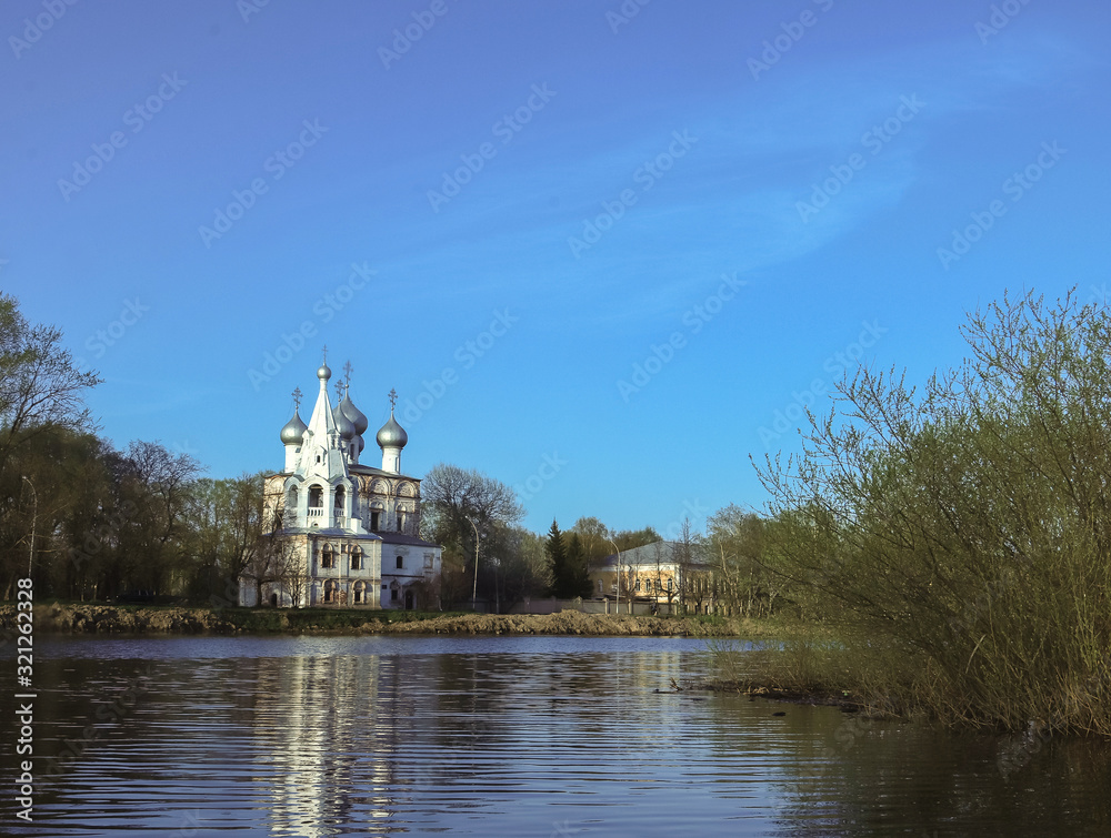 Vologda. Beautiful spring day on the river Bank. The Church in the name of St. John Chrysostom. 17th century Vologda. Beautiful spring day on the river Bank. The Church in the name of St. John Chrysostom. 17th century
