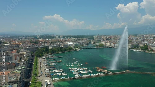 flight over summer day geneva city lakeside bay fountain aerial panorama 4k switzerland