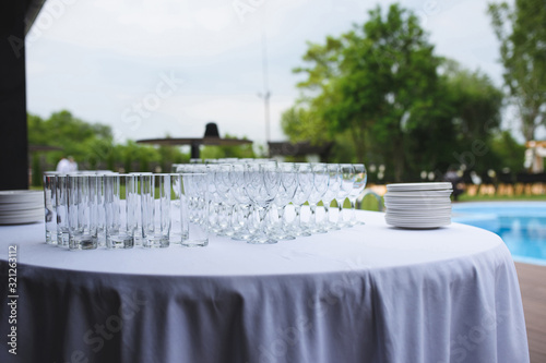 empty glasses on table at yard