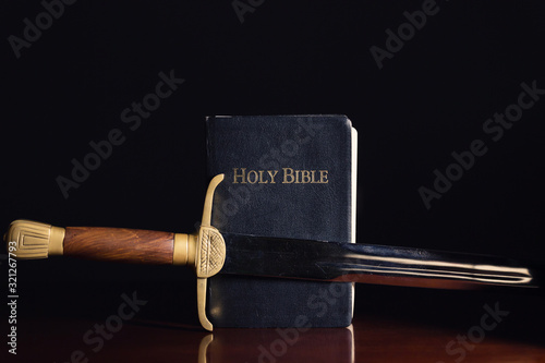 The Holy Bible with Ancient Sword photo
