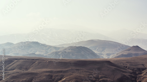 Mountain terrain in haze landscape