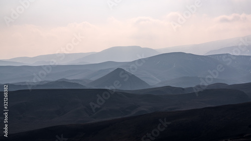 Mountain terrain in haze landscape
