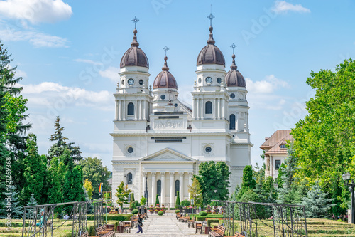The Metropolitan Cathedral in Iasi, Romania. It is the largest historic Orthodox church in Romania. A landmark church in Iasi on a sunny summer day with blue sky. Iasi Cathedral photo