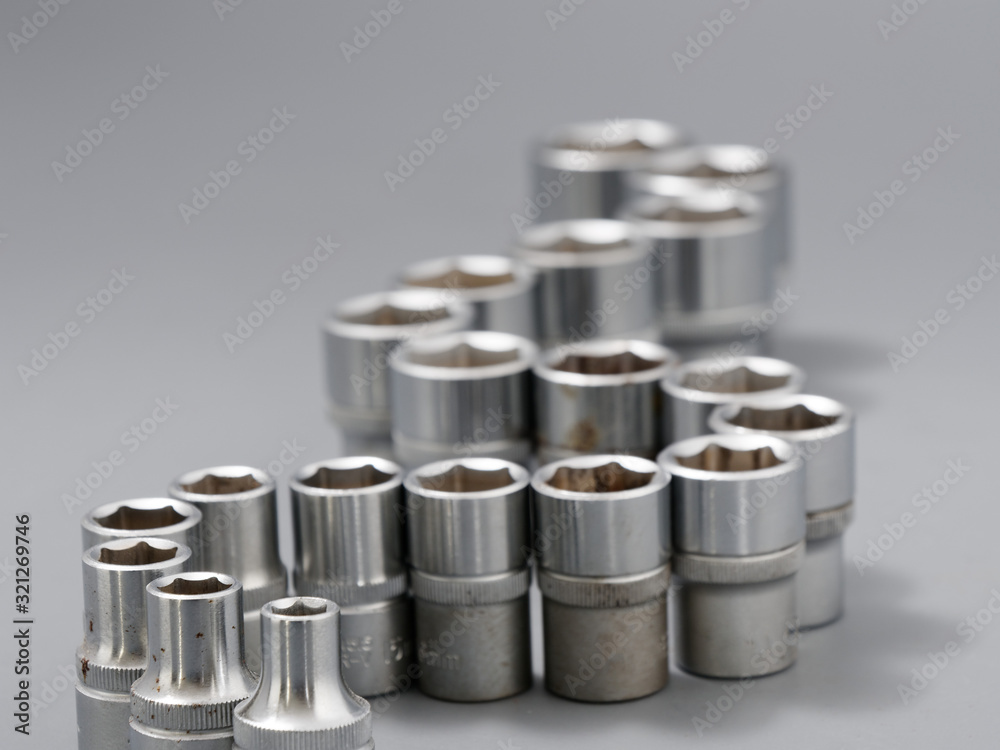auto repair wrenches on a gray background auto repair wrenches on a gray background