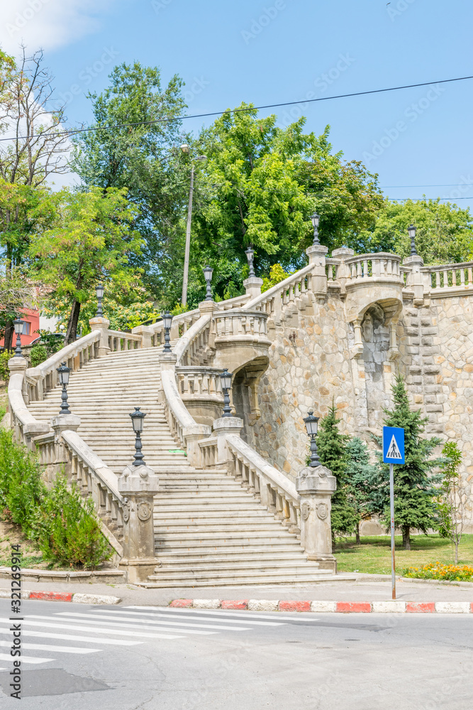 The Yellow Precipice in Iasi, Romania. The Yellow Precipice in Iasi on a sunny summer day with blue sky. Iasi historic monument