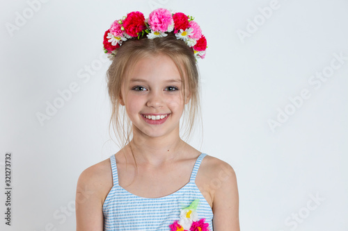 Cute kid girl smiling looking at you camera happy posing
