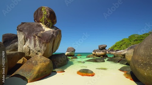 Beautiful tropical beach and rocky coastline and beautiful forest. Nga Khin Nyo Gyee Island Myanmar photo