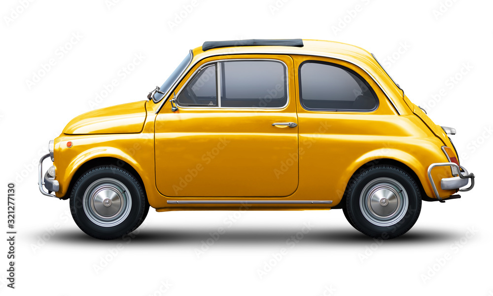 Small retro car of yellow color, side view isolated on a white background.