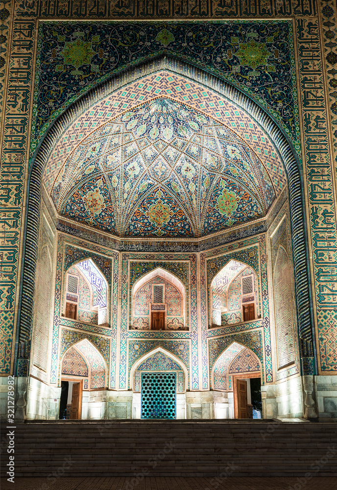 Registan square in Samarkand, Tillya-Kari madrasah (17th century). The fragment of main entrance portal. Uzbekistan