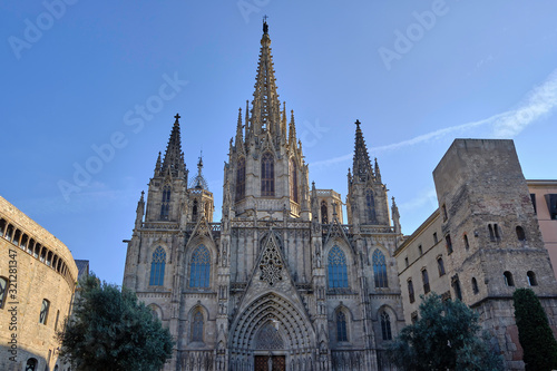 Scenic view of The Cathedral of the Holy Cross and Saint Eulalia in Gothic Quarter in center of Barcelona. Beautiful summer sunny look of catholic temple in center of most popular city of Spain
