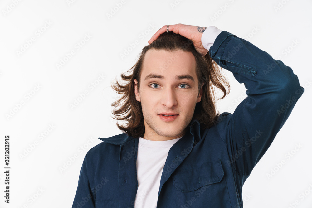 Image of attractive young man posing and looking at camera Image of attractive young man posing and looking at camera