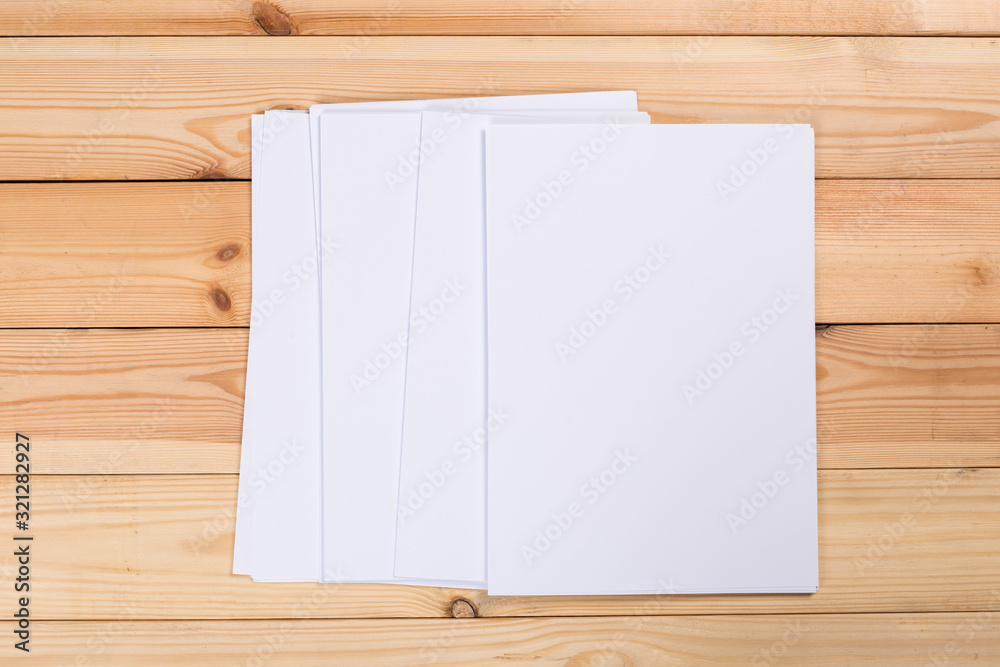 white paper on wood background and shadow white paper on wood background and shadow