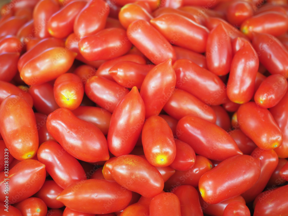 Full frame shot of fresh tomato for sale in local market. tomato background, farmer market. Full frame shot of fresh tomato for sale in local market. tomato background, farmer market.