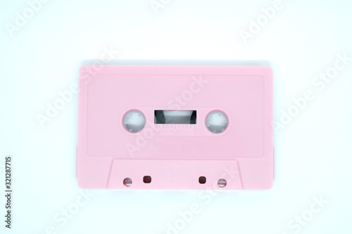 Pink cassette tape isolate on white background