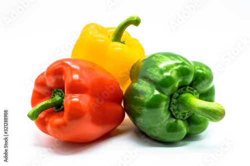 Red chilli, Green chillies, Yellow chillies, Three color bell pepper Isolated on white.