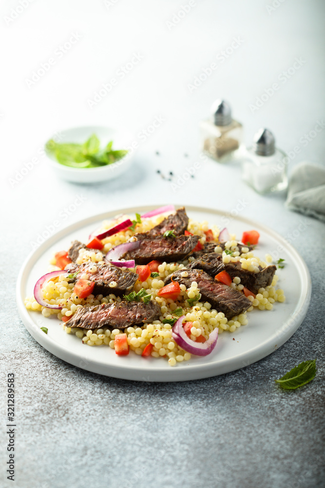 Beef steak salad with pasta and vegetables Beef steak salad with pasta and vegetables