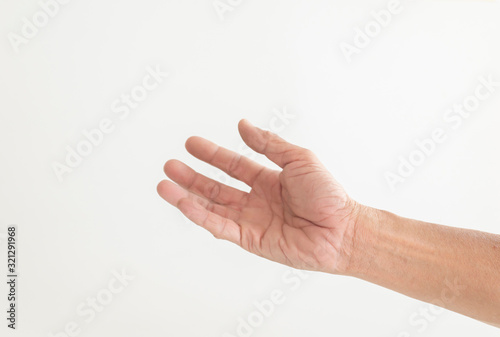 The hand gesture of the person holding the white background