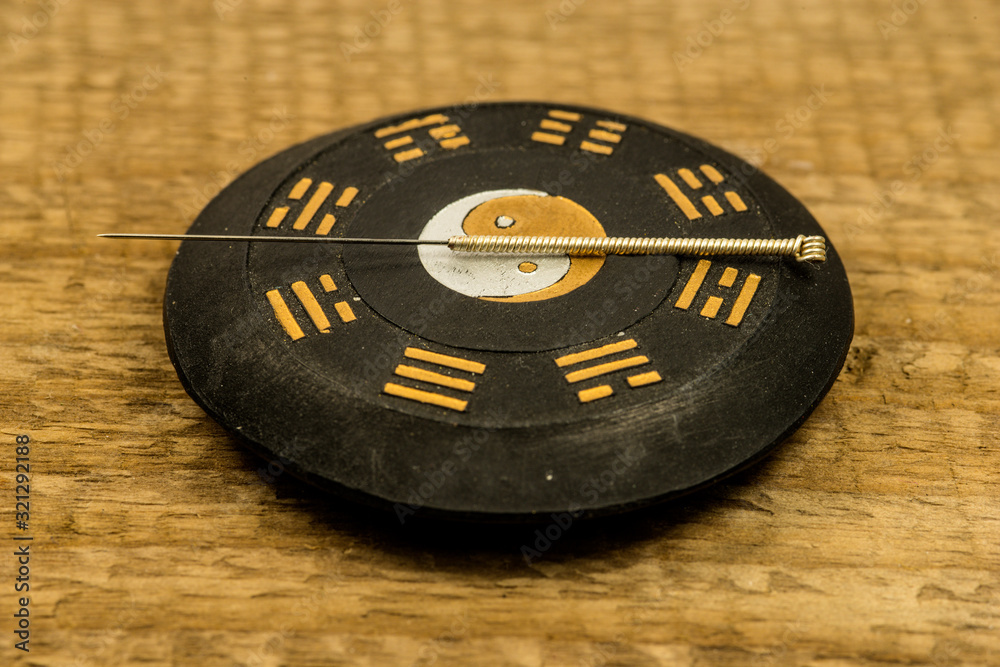 Ταπετσαρία acupuncture needle on Chinese Taoism symbol