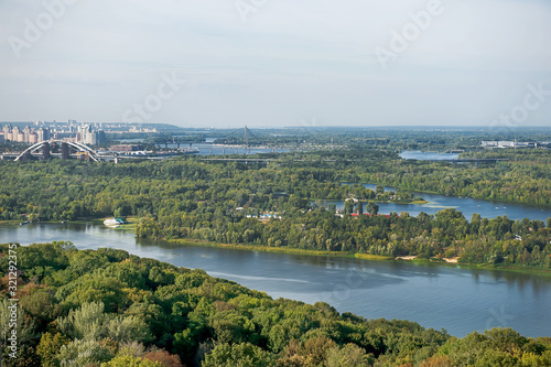 Autumn sunny hot day. Residential areas on hills in Kyiv on the left bank of the Dnieper River. Kyiv. Ukraine. © Olena Ilienko