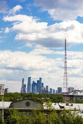 Moscow  Russia - 17.06.2019  View of the old and modern city with skyscrapers against a clear sky with white clouds