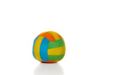 Soft colorful toy ball made of fabric for little children or babies isolated on a white background