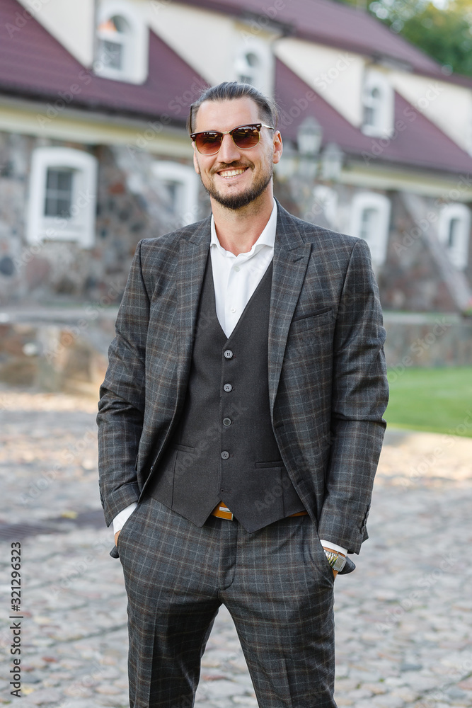 portrait of a stylish businessman on the street