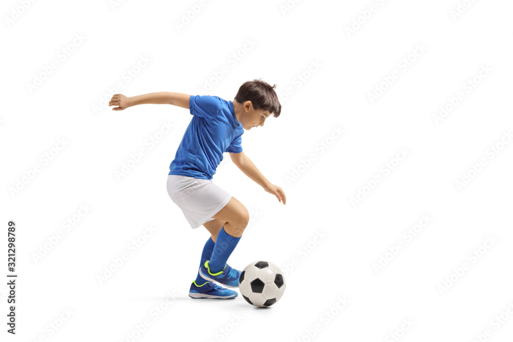 Boy in a blue jersey playing football