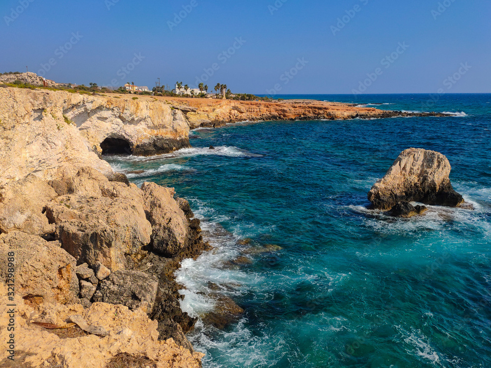 Obraz premium View to sea cave and stone cliffs near