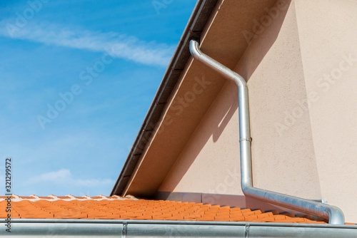 house roof tiles with gutters.