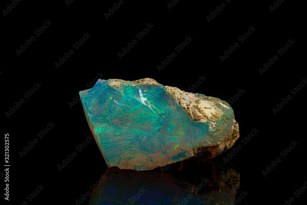 macro mineral stone rare and beautiful opals on a black background macro mineral stone rare and beautiful opals on a black background