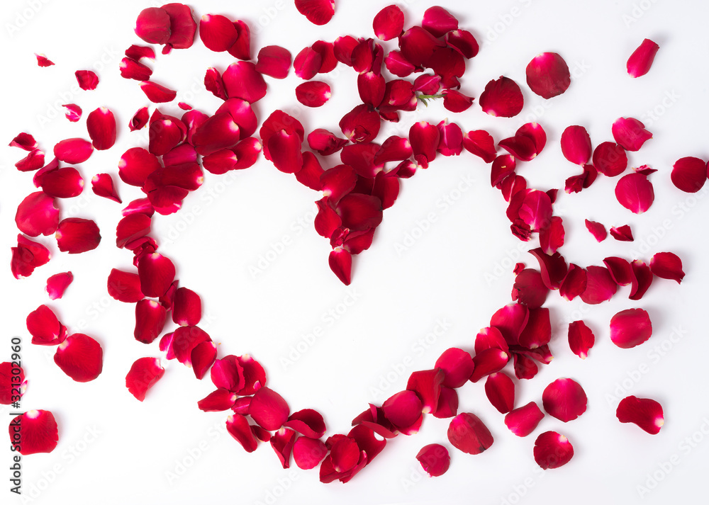 Red roses petal heart shaped  on white background
