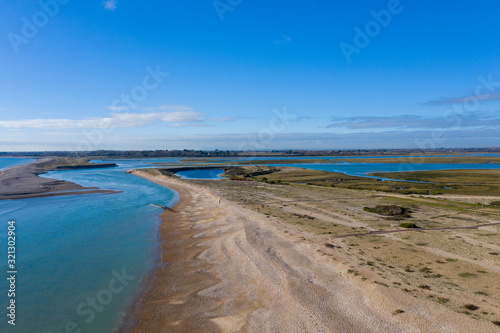 Pagham Beach and harbour aerial view on a fine winters day. © Geoff