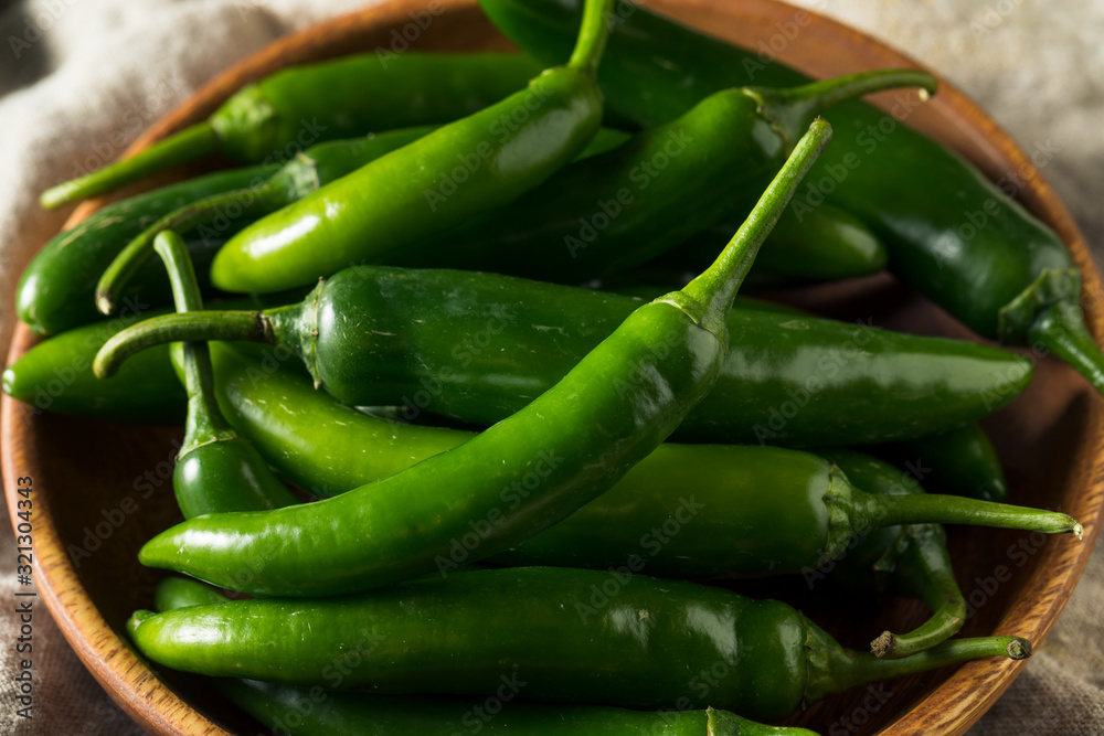 Raw Green Organic Serrano Peppers Raw Green Organic Serrano Peppers