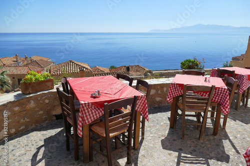 Tables of a restaurant with a beautiful view in Monemvasia