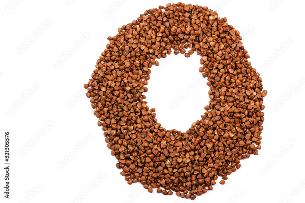 Close up of buckwheat grains isolated on white background Close up of buckwheat grains isolated on white background