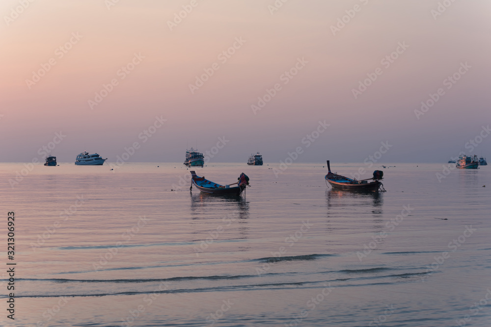 Traditional Longtail Boat at Sunset in Koh Tao Thailand